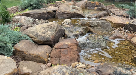 Cost to build a custom waterfall in your Amarillo , Texas landscape.